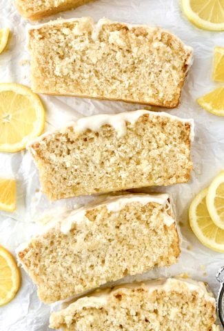 Artistic photo of many slices of the cake surrounded by slices of lemon