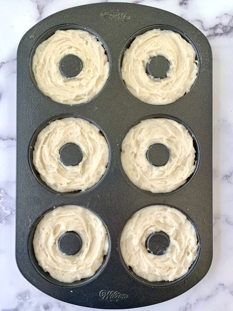 Donut batter in a pan, uncooked