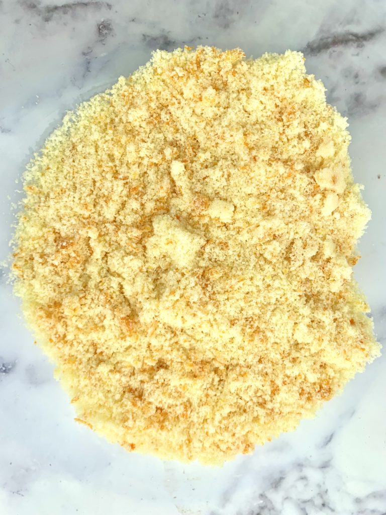 Orange zest and sugar mixture in a bowl