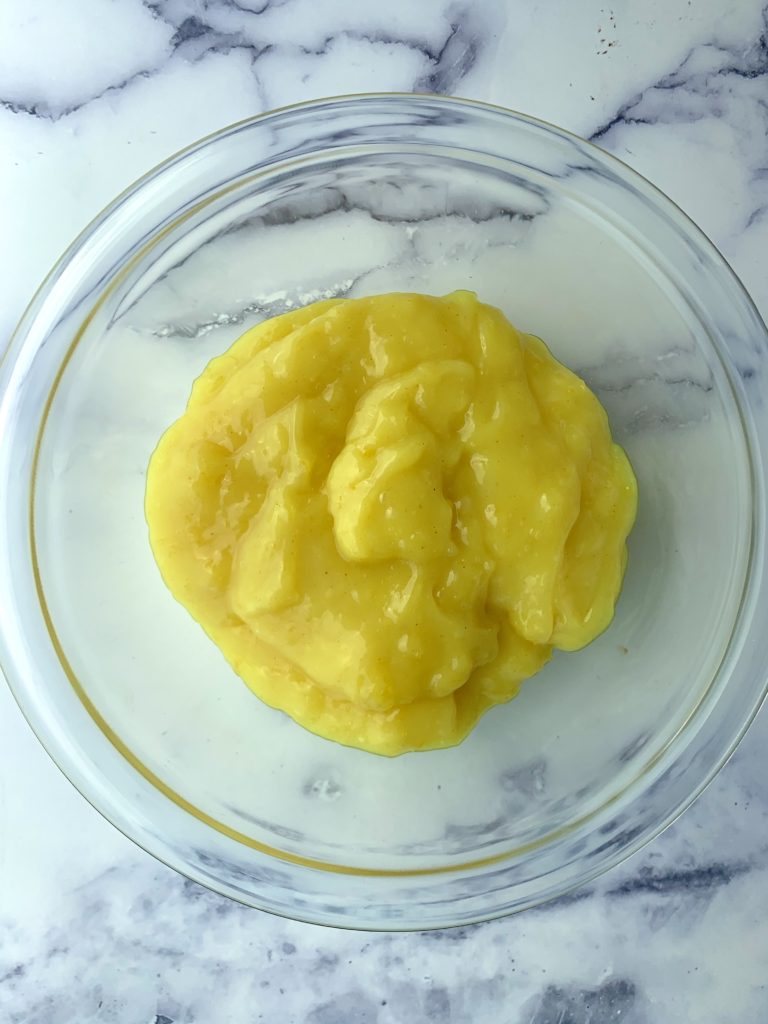 Lemon curd in a bowl, now cooled and thickened