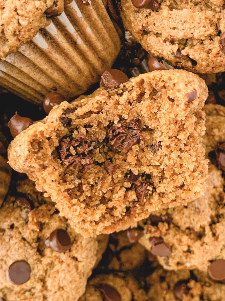 Extreme close up of the inside of one muffin with a bite taken out of it