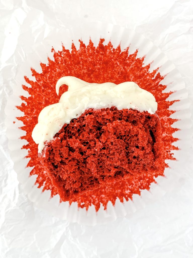 Close up of a cupcake with a big bite taken out