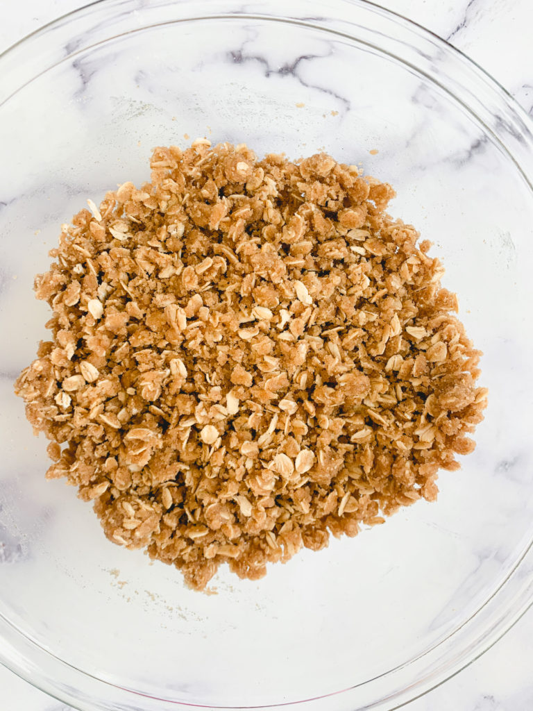 Crust/crumble mixture in a glass bowl