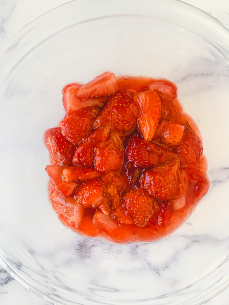 Fresh strawberry sauce in a glass bowl