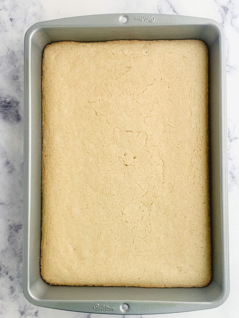 Sheet cake batter cooked in a pan