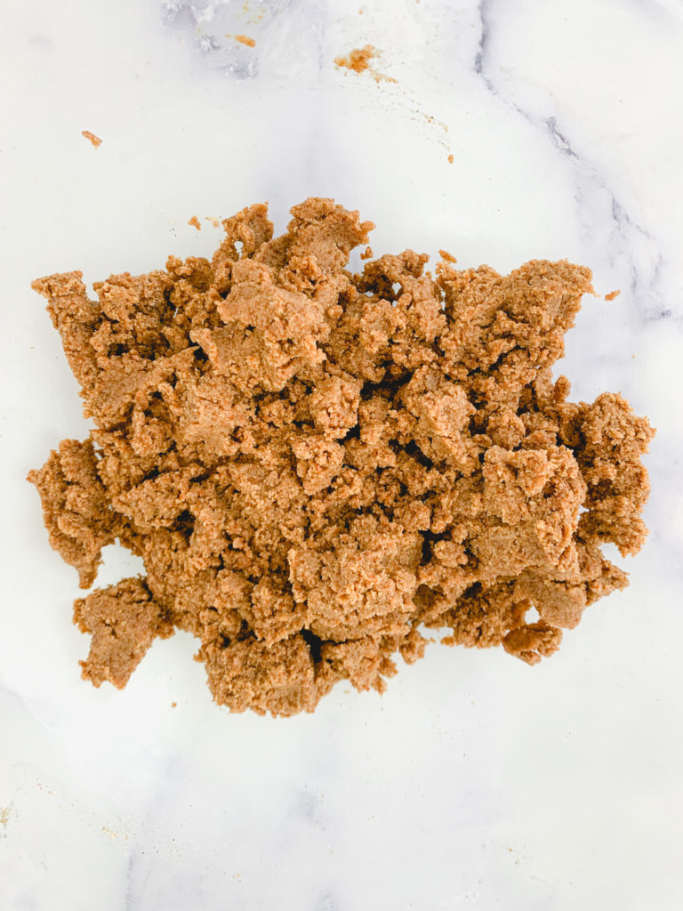Graham cracker style crust mixture in a bowl